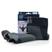 Platinum Series Spandex Gel Ankle Support Brace. The image shows the packaging box in the background, with two grey and black ankle braces displayed in the foreground. One brace is standing upright, while the other is lying down, showcasing the product's design and support features.