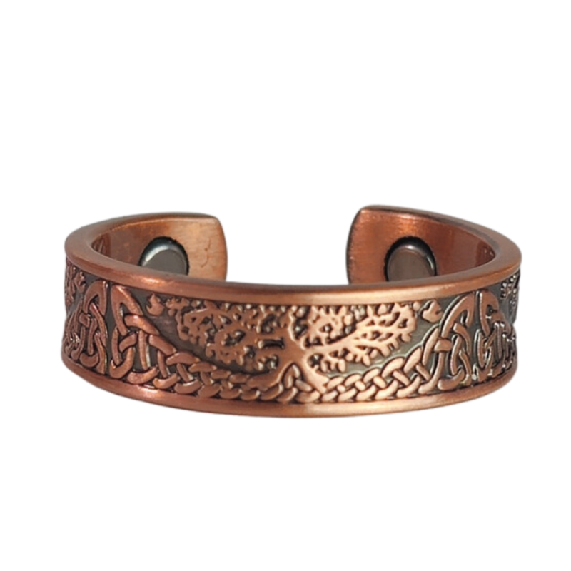 Buckthorn copper ring by Magnetic Mobility featuring an intricate Tree of Life design. This adjustable ring is designed to be easily worn on arthritic fingers, providing both style and functionality.