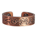 Clover copper ring by Magnetic Mobility featuring an intricate Irish design. This adjustable ring is designed to be easily worn on arthritic fingers, providing both style and functionality.