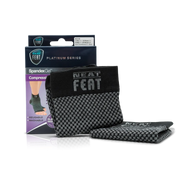 Platinum Series Spandex Gel Compression Arch Sock. The image shows the product box alongside the sock resting against it. The sock is black and grey, while the box is mostly dark blue and purple. The front of the box features an image of a foot demonstrating the fit of the sock, highlighting its arch support benefits.