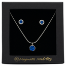 December Magnetic Mobility Birthstone Gift Set featuring a Magnetic Necklace and Stud Earrings featuring Blue Swarovski crystals, elegantly presented in a black box with Magnetic Mobility branding. These magnetic back earrings offer stylish pain relief.
