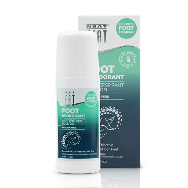 Neat Feat Roll-On Foot Deodorant in a white bottle with a green label and a white cap, with its packaging box displayed in the background.