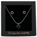 February Magnetic Mobility Birthstone Gift Set featuring a Magnetic Necklace and Stud Earrings featuring amethyst purple Swarovski crystals, elegantly presented in a black box with Magnetic Mobility branding. These magnetic back earrings offer stylish pain relief.