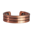 Heath copper ring by Magnetic Mobility featuring a simple design. This adjustable ring is designed to be easily worn on arthritic fingers, providing both style and functionality.