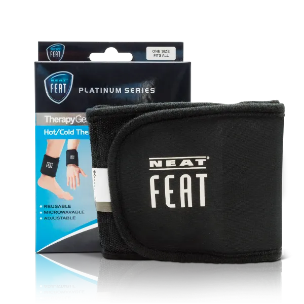 Front of the Neat Feat Therapy Wrap packaging with the black wrap featuring a white Neat Feat logo shown outside of the box.