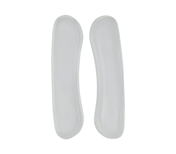 Two white, semi-translucent Neat Feat Femme Gel Heel Shields side by side, showcasing their soft, cushioned design for heel protection and comfort.