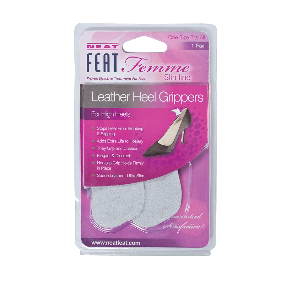 Neat Feat Femme Leather Heel Grippers, in mostly pink packaging with mostly white text, featuring a clear plastic cover that exposes the light grey grippers inside. The front includes an image of a shoe showing where to install the grippers for added comfort and support.