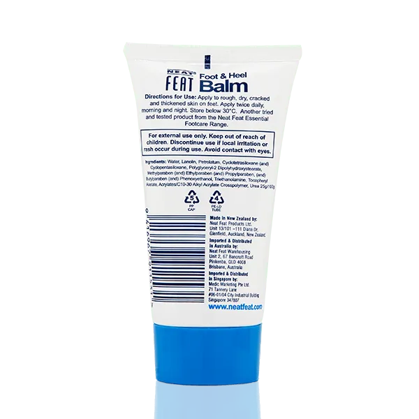 Back of the Heel Balm 75g tube, mostly white with a navy blue lid. The design includes product information, usage instructions, safety details, and a barcode, all in a clear, easy-to-read layout.