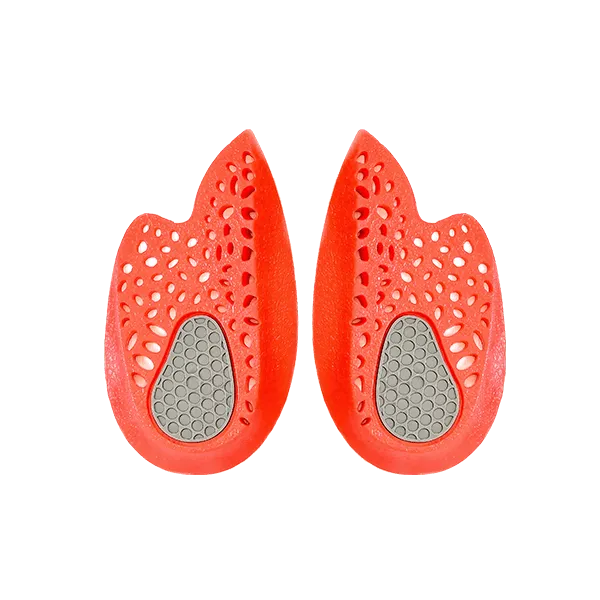 The sole of the Platinum Series Spur Pad for Pressure Relief and Inflammation, featuring a textured design with a grey centre and red outer edges. This design aims to provide enhanced comfort and pressure relief.